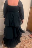 I purchased this as a bridesmaid dress for my best friend's wedding. She wanted multi-texture and colors for all of us. This dress was perfect, especially for anyone with curves. It hits in all the right places and is very flattering. - Amber H.