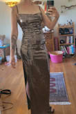 I bought this dress 2 months before my cousin's Long Island wedding. The fit was great, loved it. I tried it on only 2 times and the glued-on sequins are falling off! I treated it delicately and hung it, but the sequins were dropping like flies. It is quite noticeable and makes the dress look very cheap. The wedding is next weekend and I am so disappointed. Lulus, is there anything you can do to make this better? I thought the quality would be a bit better given the price. - Julie D.
