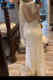 I love this dress! My measurements are true, I ordered a large because I'd rather it be too big than too small, it's only small in the chest area which I expected. Only minor alterations are needed there. Stretchy soft material. Beautiful open back. Low neckline but I don't feel like I'm falling out. 10/10! If you're between sizes like me- size up because minor alterations are better than major. - Christa C.