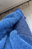 They're certainly soft, but I purchased the Midnight Blue pants in hopes of wearing them as a matching set with the Midnight Blue sweater, as it's advertised. To much disappointment, the pants are a different color. It's a darker, almost purple shade while the sweater is a true blue. I'm a long-time fan of Lulus but this one was disappointing. - Sharon C.