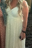 I bought this dress for my wedding reception. It was very pretty and comfortable for dancing, eating, etc. The only thing I had to do was see the bust together because it came out a little bit big on me. I was more comfortable having it come together a bit higher. - Sierra D.