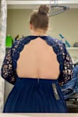 The dress is beautiful! It looks just as pictured. The sleeves we tight as stated in previous reviews- which is my only issue with the gown. Buying a bigger size won't fix the sleeve issue, there is just no stretch to them. Overall, it's gorgeous and I can't wait to get it tailored. - Alex A.