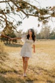I wore this for my engagement shoot and loved it! It's not too short for the tall girlies and has good coverage in the bust! It's lined so it's not see-through and very comfy. I will be wearing it in reg life for sureeee! :) - Emma M.