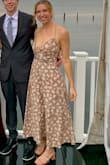 I loved this dress, the color and style are fabulous. However, I spent the entire night yanking up the front so I didn't flash everyone - it does not work on average-sized busts very well. I wish I had had a tailor put a few stitches to close up the busy portion. - Caroline S.