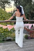 This jumpsuit is absolute perfection. Being 5'7" it's rare a jumpsuit is ever long enough. Not to mention torso and leg ratio was perfect. The thick fabric and the wire in the bust "V" provides so much support and shape. Highly recommended. - Taylor S.