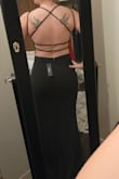 I typically don't buy dresses that expose my back, but I figured I'd try something new. I am so glad that I did! This dress fits like a glove. I absolutely cannot wait to wear it! The only thing I didn't like is that it's tricky to get into with the straps. I'm typically a size 6. I bought a Medium. - Kristen G.