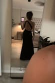 This dress is a classic. It fits perfectly, has decent support if you have larger breasts, and stays put. I had to have the strap taken in about an inch because my shoulders are petite. The length for me was perfect in heels. - Jessica B.
