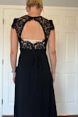 Got this for a Halloween masquerade ball. Loved it when I saw it online and loved it even more when I tried it on. The only minor issue is that I can't wear a bra with it because of the open back, but I'm going to work it out with tape. It's great quality and very flattering. I love the flowing skirt and the length. Just touched the floor with 3.5-inch heels, will ultimately wear shorter heels and don't mind that it will drag a bit as I wanted a long dress. The photo of the back is with a strapless bra. - Katie S.