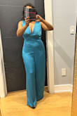 Omg, one of the most stylish jumpsuits I have! The satin fabric is thick and feels super soft! I love the back style! I ordered medium and it's big on me! I did trim it in the bottom and have to alter bit but it's not a big deal. I am very happy with this piece. - Urja P.