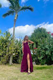The actual dress arrived more purple than what was advertised, but it was still a matching colour. It fit me perfectly, but the dress itself was a little too long and dragged on the floor a bit; so make sure to wear really high heels if you're under 5'5. - Vanessa S.