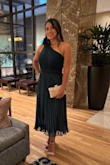 I received many compliments thanks to my dress. It fit me perfect, the size L. (First I bought an M size, but it didn't fit me so please check the measures because this dress doesn't expand at all). Elegant, fresh, and soft. I loved the dress and [beautiful color]. Apparently, everyone at the party thought the same. - Norma C.
