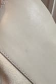 The toes of my boots look like they came from a totally different design (one pointed, the other rounded). There is also a spot on one boot that looks like an ink mark that was wiped off. I needed these for a wedding the day after they arrived, so I wasn't able to return or exchange. - Heather L.