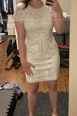 The dress is of amazing quality! Layered, and thick enough, and the beading and detailing are beautiful. I have an hourglass body shape and I was between Medium and Large. Ordered the Large and it was a bit too big, which is fine. But the length is so long. I would have preferred it a bit tighter and shorter for a true bodycon dress fit so I am ordering again in a size Medium. - Adrianna E.