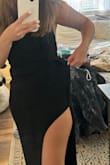 I wanted to love this dress, the quality is nice and thick and stretchy, and for the most part, it hugged my body really nicely. I ended up returning it for two reasons: one being that the slit was way too high for me, making it not appropriate for the event I wanted to wear it to, and as noted by other reviews, there's a weird flap of extra fabric around the slit area which kind of just hangs there. You can't really see it in the stock photo. My second photo shows this. - Micaela K.