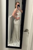 This fits perfect, as per the measurements they provide. It's beautiful and really high quality. I will be wearing this for my beach wedding. Absolutely perfect in every way - Chantal B.