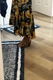 At 5'2", the XS is longer than I want in the back, but the curved hem line made it an expensive alteration, so I am leaving it alone. It needs a clip at the bust. A perfect, lightweight dress for vacation! - Maggie M.