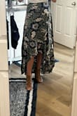 At 5'2", it's slightly longer than I would like in the back, but overall great quality and very flattering for a small waist! - Maggie M.