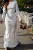 The dress is perfect. It fits the body very well but it is a little transparent so you need beige underwear. I loved the dress. It made me feel like a princess. - Karen S.