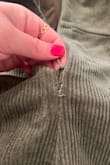 This piece runs small. The zipper isn't secure enough. It was too expensive for the quality I got. - Isabel C.