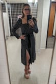 This dress is really cute; I got a lot of compliments on it. The material is thin but comfortable so it's good in warm weather. The only downside was that the way the sleeves are designed, it's hard to raise your arms above your head. - Laura M.