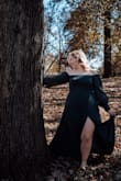 I wore this dress as a second outfit for my engagement photoshoot and I love it! It has such a nice flowy feel and is a beautiful rich color. I will definitely be looking for excuses to wear it again. The slit on the leg was just enough "spice" and the neckline is gorgeous. I especially love the button details on the sleeves. - Courtney S.