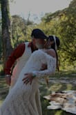 This dress was perfect for my boho river with a teepee arch. It was long with a little train, and fit beautifully. It was a huge hit. I got plenty of compliments. The material had a little stretch to it. The sleeves were perfect. I loved my wedding dress. Thank you Lulu's - Kristy F.