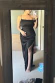 This dress is flattering! I was 7 weeks postpartum wearing this dress, and I felt really great in it! The ruching could be better. It fit my large chest without having to wear a bra, and I was also able to pump easily in this dress! - Gabby M.
