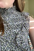 Could definitely wear it to work! It's modest while still being cute and comfortable!! The neckline was not suffocating, which I appreciated, and the buttons on the back were easy to work with! The dress was longer than I had hoped, but nothing heels can't fix! - Katelyn T.