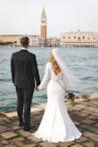 Absolutely loved this dress! I usually wear mostly small, but the small one was definitely too tight. Medium was perfect! I got a belt from David's Bridal that really tied it together. It broke at one point, and I still loved the pictures without it. - Myranda C.