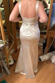 So beautiful but I had to put $200 into it to alter it. I had it hemmed (it has a lining too), taken in at the waist, straps were adjusted, and I had a bra added. It was for my daughter's second dress for her upcoming wedding so we have no regrets but for this type of material, it needs to fit perfectly - it's gorgeous on her and she feels great in it. Photos are after alterations. - Katie M.