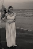 Wore this for my elopement and it was perfect! Very light which was great for the beach. A little long, I wasn't wearing shoes. - Brooke G.