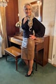 The skirt is amazing because it gives you a sleek leather look while being so comfortable at the same time! It runs true to size and comes in various colors! Here I am wearing the tan, but I also have the red and the black skirt! - Patricia W.