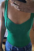 This top fits great and hugs my body. I'm afraid of washing it and possibly shrinking it so I probably won't throw it in the dryer. It looks exactly like the photo and I'm excited to wear it out! - Chriselle T.