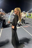 I loved this dress and the amount of compliments I got was mind-blowing! The fabric is thick, sturdy, and stretchy, it's great. I felt so elegant and very happy with my choice for the senior homecoming court! - Gentry T.
