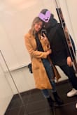 This coat is amazing! I ordered it for a work conference up north (quite warm where I am currently) and it tied all my outfits together! After reading the comments, I ordered one size down (I am usually a medium so I ordered a small). When I received the first order, it was still way too big, so I ordered an extra small to replace it. The extra small was perfect and still had a bit of room! Highly recommend this jacket and encourage you to buy two sizes down from your normal! - Courtney W.