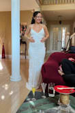 I loved this dress! The material is really nice. The back was the show stopper of the dress. I just felt it showed too much of my stomach shape. But highly recommend!! - Lara K.