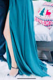 Beautiful dress! I'm still nursing and my bust fluctuates, so it's not for the larger-breasted women, but I loved this dress. Runs a *tad* tight in the bust and belly area because it's tufted. Perfect length. Classy slit yet sexy, purchased for a family photoshoot. - Haley R.