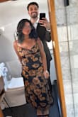 I fell in love with this dress as soon as I saw it!! I originally purchased it in a large and it was quite big. So I sized down to a medium and it fit a lot better! Not sure if I could've sized down again... but I didn't have time lol! Wore it to a wedding and absolutely loved it! - Esmeralda S.