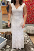I absolutely loved this dress for my wedding! I got so many compliments on it too! I had some alterations (cups, some hemming, and bustle) and added a belt for some sparkle. It was comfortable to be in all day, the material was kinda stretchy so it allowed for dancing and no itching or discomfort. Overall, I'm soo happy with my purchase! - Stephanie K.