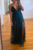 I think this dress was made for tall people. I'm 5'4", and even on my tippy toes, the dress is still so long that I could trip on it. It is a gorgeous dress though! - Julie W.