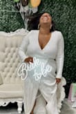 Great dress! I was apprehensive about buying it at first, but it has more stretch than I anticipated. It was definitely a statement piece for my bridal shower! - Britni C.