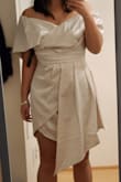 It was out of stock when I was first looking for elopement dresses, but I'm so glad it came back and tried it out. You MUST try it on with it fully zipped and hooked to really see if you like it. I didn't the first time and didn't care for it, but I loved it the 2nd time when I did (see both photos). It is really hard to zip up at the thick waistband, so multiple hands are needed! It's a champagne color, easy to steam, and super flattering, especially at the chest for those that are smaller. Received so many compliments, and I can't wait to wear it again for other events! - Jamie L.