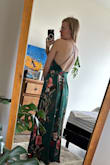 It's a bit big around the waist, but it's just more comfortable. I love the bust, I have a small chest (85B) but I feel safe from a nip-slip and flattering in the cleavage. I adore the back. I was a bit sad that the red colors weren't as popping as they were in the photo. - Lea B.