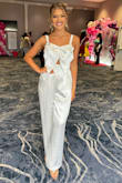 I wore this to my pageant for Check-In. I got tons of compliments! Very flattering and beautiful. Material wasn't as bad as others say, but I'm careful with it because of the comments. :) - Briana W.