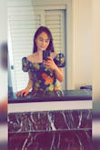 Beautiful dress. I stood out from the plain black and red dresses. It was a wee bit short. I have thicker thighs; one funky move, my buttcheek would be out, but it wasn't bad at all. - Stephanie L.