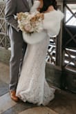 I wore it for my wedding day and absolutely loved it. Showed up beautifully in pics. Was concerned at first that it looked like something a teenager would wear, maybe not sophisticated enough. Tried it on again and fell in love.

It does have one sturdy closure. At first, I thought it didn't fit or lay properly on me, then I played around with it, moving it to the side, sliding a bit off the shoulder and it looked great all ways.

Wore it with a lace off-the-shoulder Lulus dress. Would definitely buy it again. - Christina V.