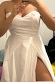 This dress is so beautiful! Classy and simple. I would recommend this dress. However, it does run small and has a very high slit. I ordered a size 10, and it didn't fit. The zipper couldn't go up all the way. Order a size bigger if possible. - Marlena T.