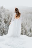 This dress made me feel so stunning, and it was so simple and perfect. A little thin for my snow wedding, but I wore leggings beneath and was overall fine. Bra wasn't necessary, and the dress was still covering my chest. Complimented my 15 week bump well! It was the perfect length for this tall girl, and you couldn't even tell I wore hiking boots below! It got muddy and I didn't sweat it for a second because it was a steal of a deal. So many compliments. So lovely. BUY IT. - Caitlin F.