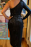 This dress is so beautiful. It's good quality, comfortable, and super stylish. The sequins make it dressy and elegant. So does the midi length and asymmetrical hemline. I ordered a medium and it was stretched out. You can tell someone bigger had tried it on and stretched it out so Lulus is sending me a replacement without issue. Love their clothes and their customer service. Highly recommend! - Marline K.