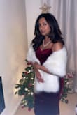 I wore this to my partner's holiday party and it was super classy and flattering! It cinches the waist and is looser around the hips creating an hourglass silhouette. I was worried about ordering an XS online as I am usually in between XS and S but it fit so well! - Selina